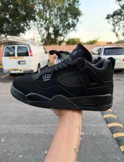 Black Cat Jordan 4s