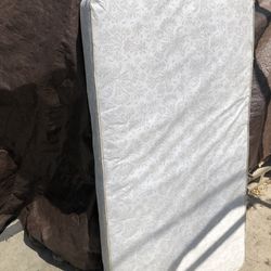 Free foam mattress. Fits a Toddler bed or a crib. 