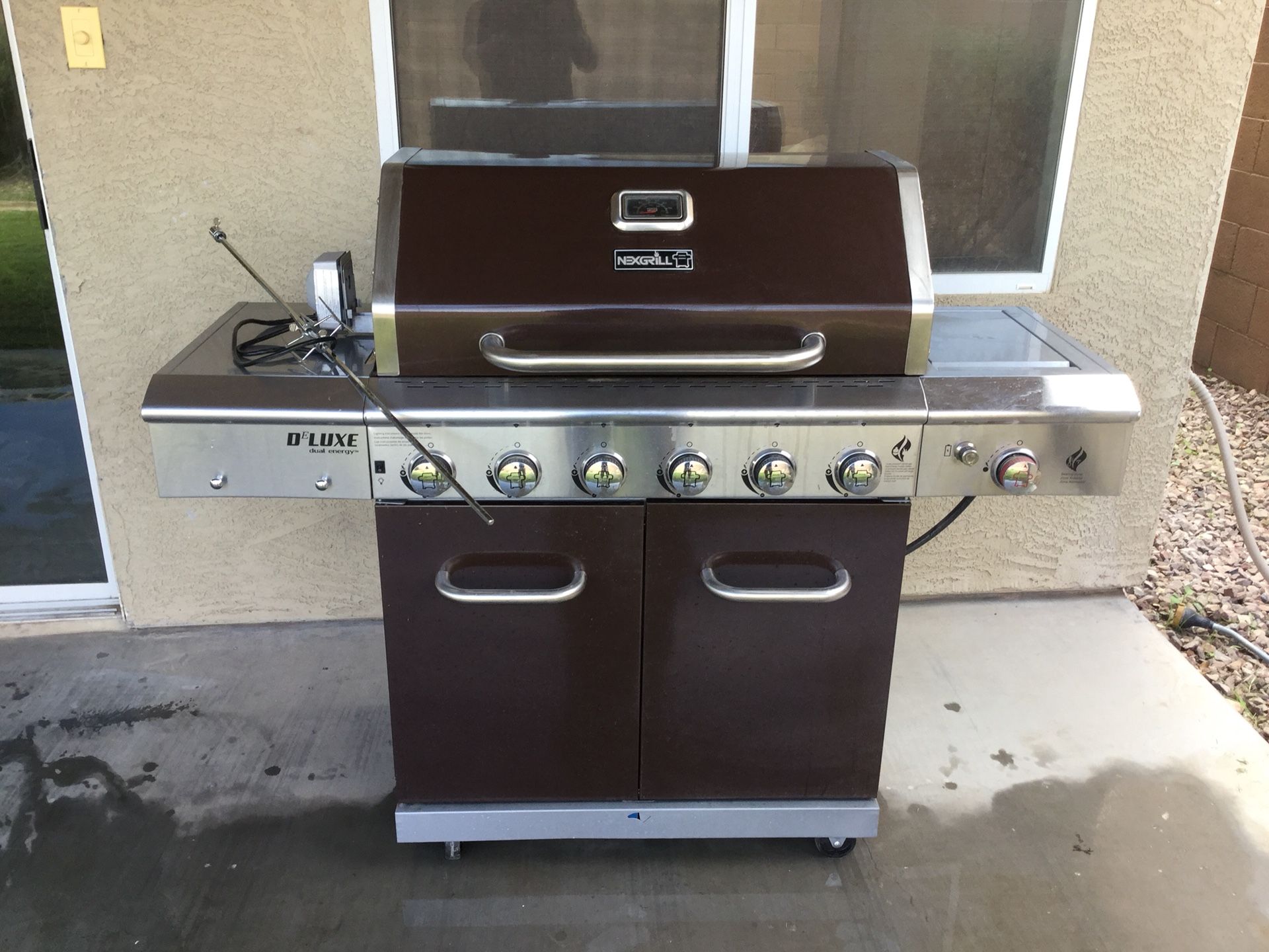 NexGrill Deluxe dual energy 6 burner barbecue grill. Home Depot Retail