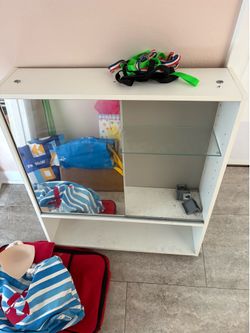 GIVE: medicine cabinet