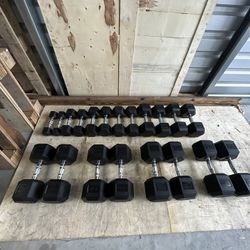 New pair of 5,10,15,20,25,30,45,50,55 and 60lb rubber dumbbells NEW IN BOX $630