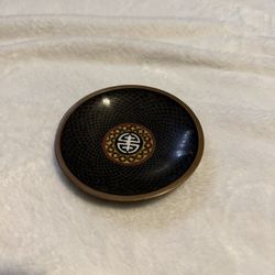Black and gold ceramic bowl