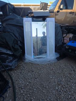 Large Hampton bay medicine cabinet glass with glass movable shelfs.