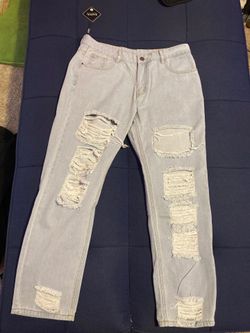Brand new ripped jeans