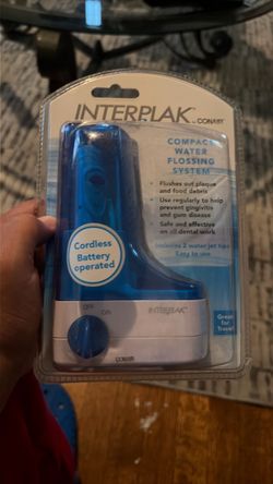 Interplak by Conair Compact Water Flosser Enter plaque by Conner