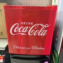 Nostalgia Electrics Coca-Cola 1.7-Cubic Foot Mini Fridge (Model CRF170COKE).