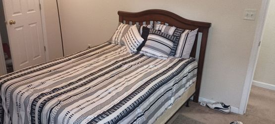 Full size bed with mattress and box spring