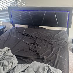 Queen Bed and Painting