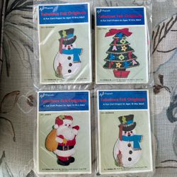 4 Vintage Felt Originals Christmas Ornament Kits # 1038 one Christmas tree #1023 two snowman #1035 one Santa All are new old stock Unopened packs