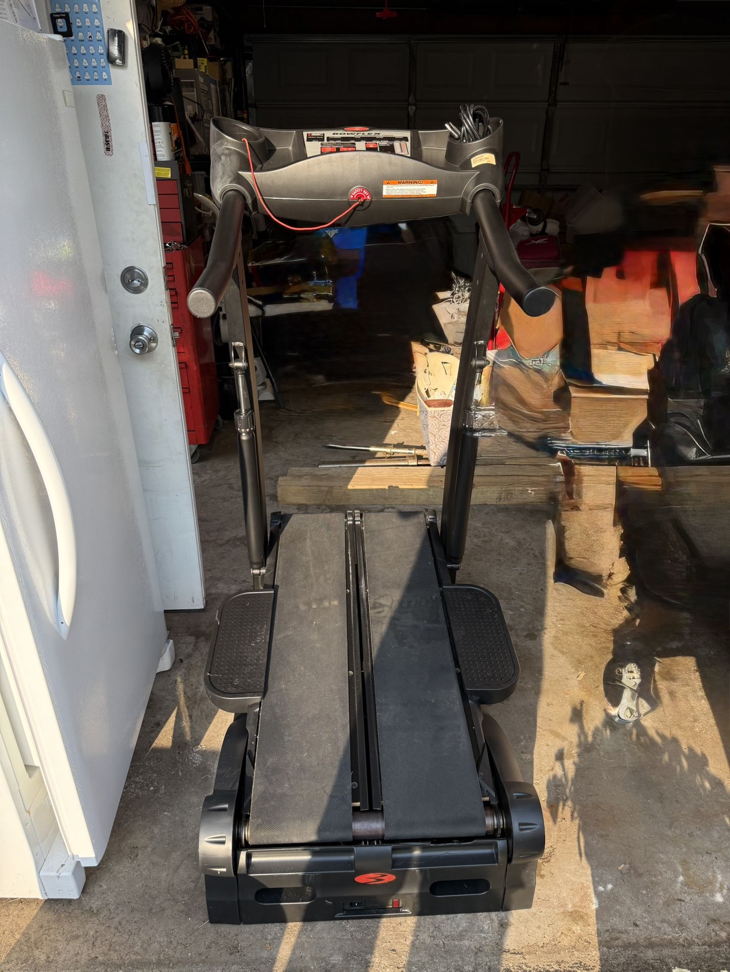 BOWFLEX SPACE SAVER TREADCLIMBER TC5,000 TREADMILL IN GOOD WORKING CONDITION. $400.00 OR BEST OFFER.