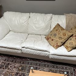 White Leather Couch With Matching Single Person Sofa And Ottoman