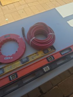 Assorted Hand Tools - Levels, Extension Cord, Fish Tape, and Air Hose
