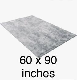 Grey shaggy area rug