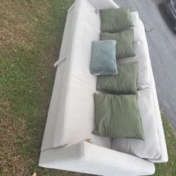 Light Gray Sofa with Green Pillows – Great Condition