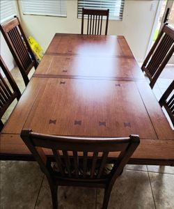 7 piece Dining set with 6 chairs + a matching credenza and curio cabinet