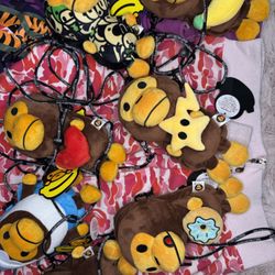 BABY APE CROSS-BODY PLUSHIE