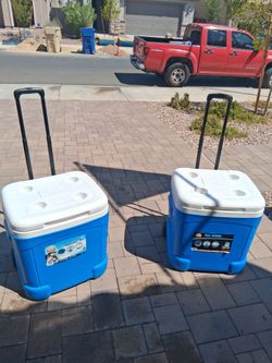 (2) Igloo ice cube coolers 60 qt. 90 cans