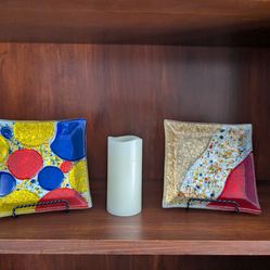 A Pair of Mini Multicolored Glass Trays for Display with Stands