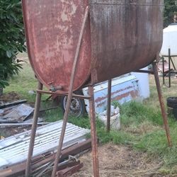2 Large Steel Containers/tanks 1 Plastic