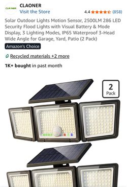 Solar outdoor motion sensor floodlights W visual battery 2 pk