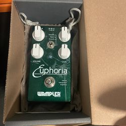 Used Euphoria V2 Guitar Pedal comes with box, papers, and stickers