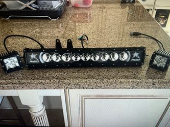 Rigid LED 20” Light bar and two Additional Side Led Lights.