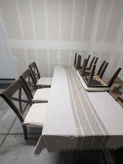 Ashley solid wood dining table & 6 chairs / $220 for all