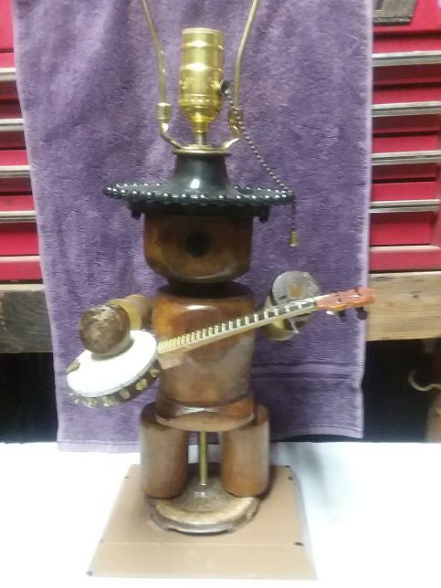 Wood people with lamp
