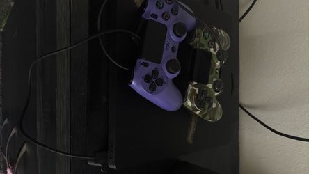 Black to controllers one purple one camouflage