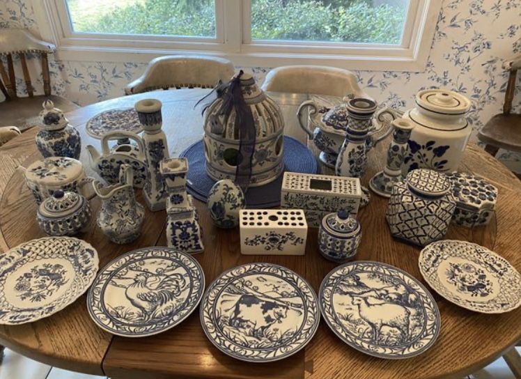 Blue and white plates, pitchers and other decorative pieces