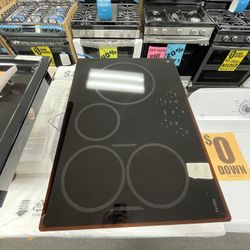 BLACK BUILT IN ELECTRIC STOVE