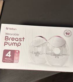 Wearable breast pump