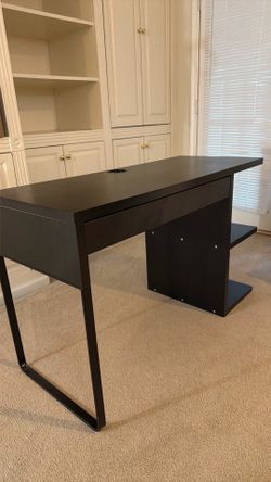 Desk with drawer and shelves