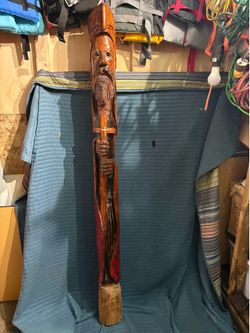 hand carved totem 77” tall