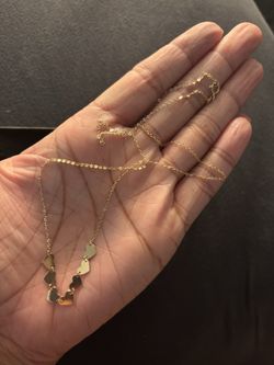 14kt gold heart necklace 18 inch asking 200$ or best offer