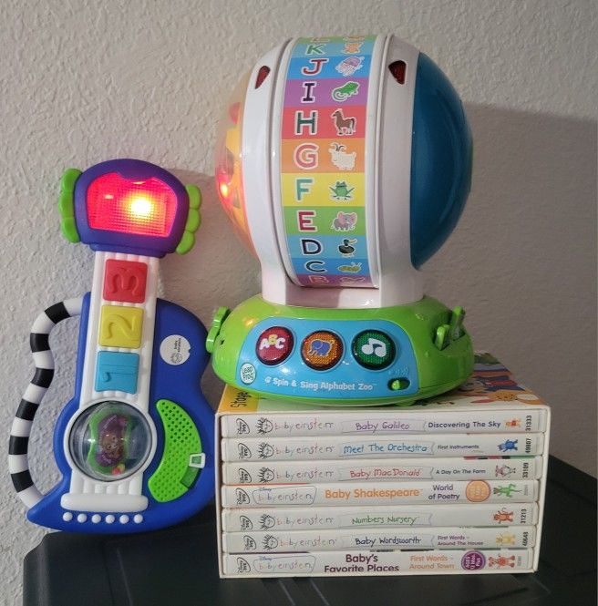 Baby Einstein DVD Collection, Baby Einstein Guitar Toy and Leap Frog Spin & Sing ABC Zoo