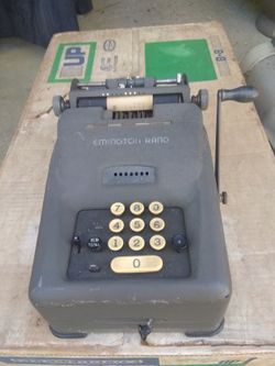 Antique adding machine