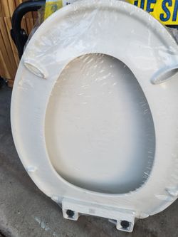 Brand new white Kohler toilet seat