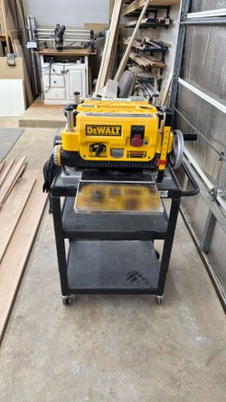 Dewalt 13” Thickness Planet With Rolling Stand. Planer Has Been Upgraded To A Shelix Spiral Cutter For A Smoother Cut.