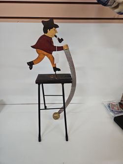 Folk Art Man with Saw Balance Toy