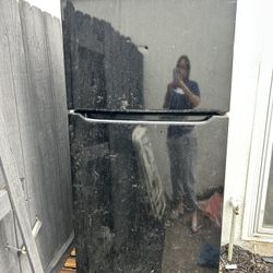 Black refrigerator just needs to be cleaned. Needs to be gone as soon as possible. Make offer.
