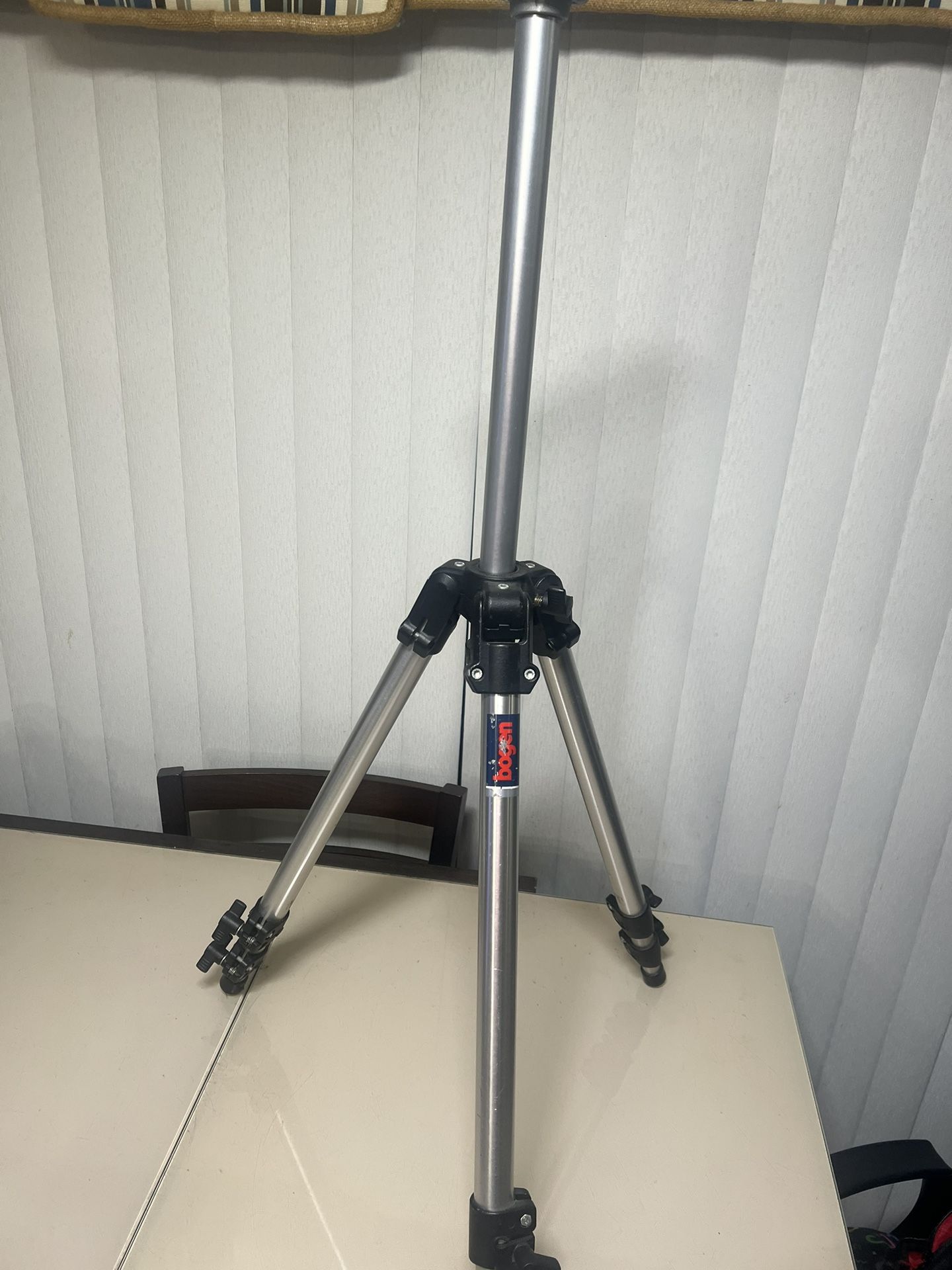 Bogen/Manfrotto 3011 Tripod Legs, Chrome, 22-67" ( Base Only, Head Not Included). Used in good condition with some minor cosmetic blemishes. These ble