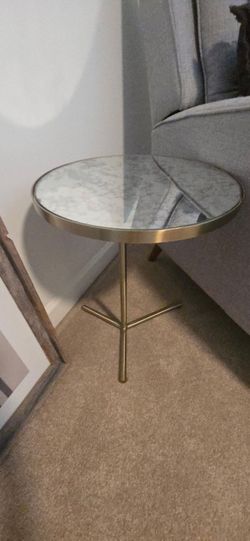 Round mirror brass accent table