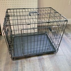 Medium size black wire dog crate with leakproof pan. 17" wide x 19" tall by 24" long