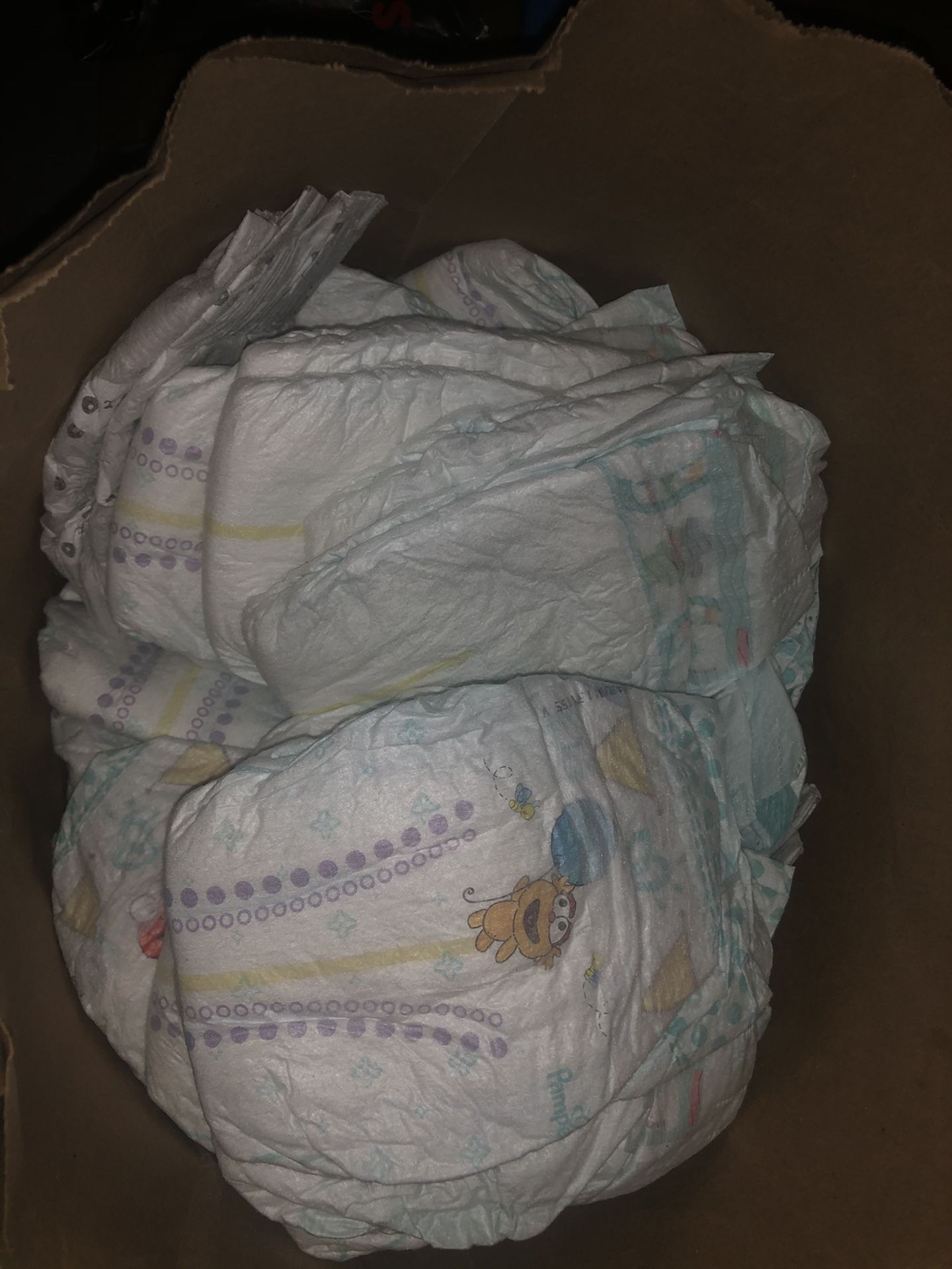 Pampers mainly size 1 & NB Diapers.