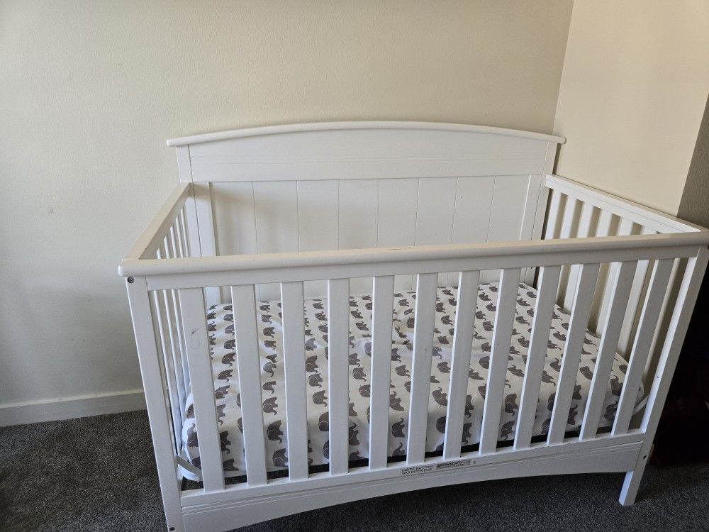 Delta Children Emery 4-in-1 Convertible Baby Crib - Greenguard Gold Certified, White