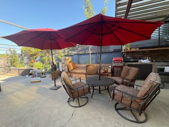2 Umbrellas with Outdoor Table and Chairs