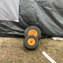 20 x 8 x 8 rear Mower tire and a 15 x 6 x 6 front riding mower tire