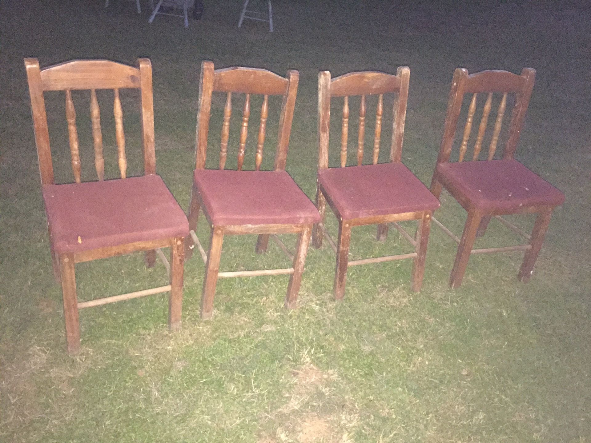 Four wooden chairs used