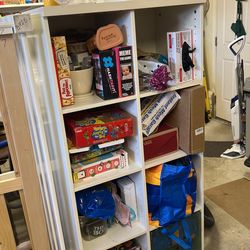 30 inches wide 18 inches deep 60 inches tall, toy cabinet or storage